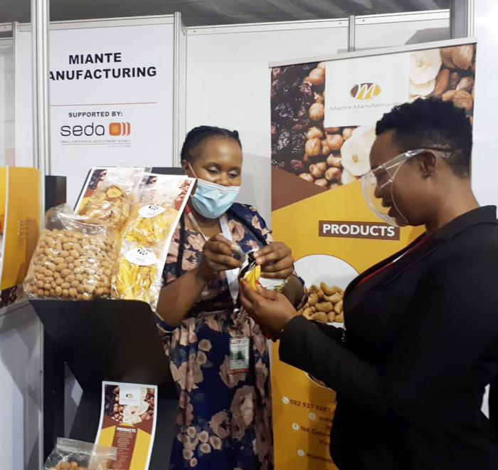 Minister Stella-Ndabeni Abrahams engaging SMMEs at the Intra African Trade Fair in Durban ICC